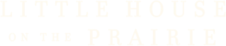 Uma Casa na Pradaria logo
